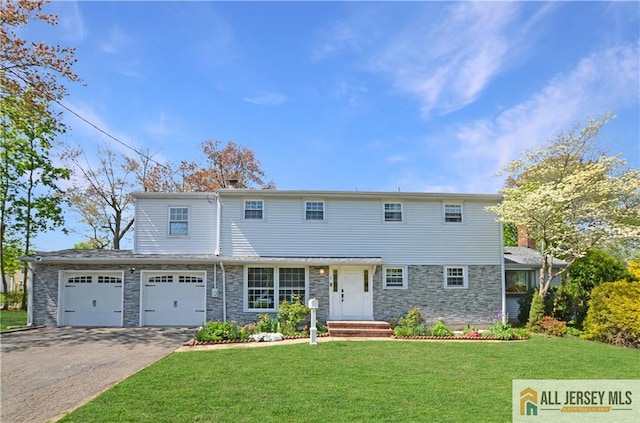 view of front of house featuring driveway, stone siding, a front lawn, and an attached garage