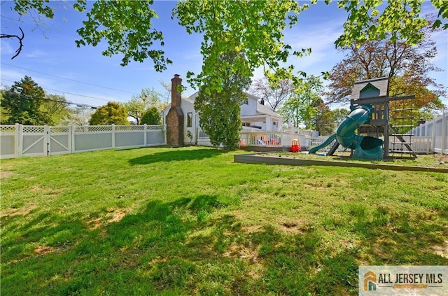 view of yard with a playground