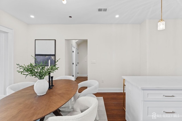 dining room with recessed lighting, visible vents, baseboards, and dark wood finished floors