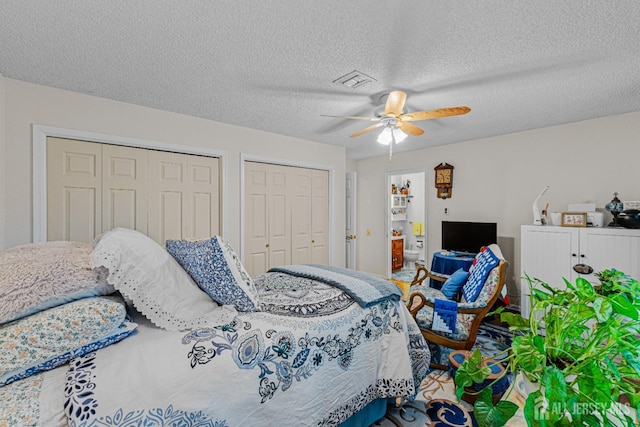 309 Sharon Way Unit A, Monroe, NJ 08831 - bedroom with ceiling fan, visible vents, multiple closets, and a textured ceiling