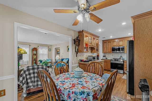 309 Sharon Way Unit A, Monroe, NJ 08831 - dining space featuring ceiling fan, recessed lighting, a toaster, and light wood-style flooring