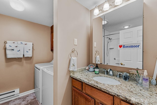 309 Sharon Way Unit A, Monroe, NJ 08831 - full bath with a baseboard heating unit, walk in shower, vanity, and independent washer and dryer
