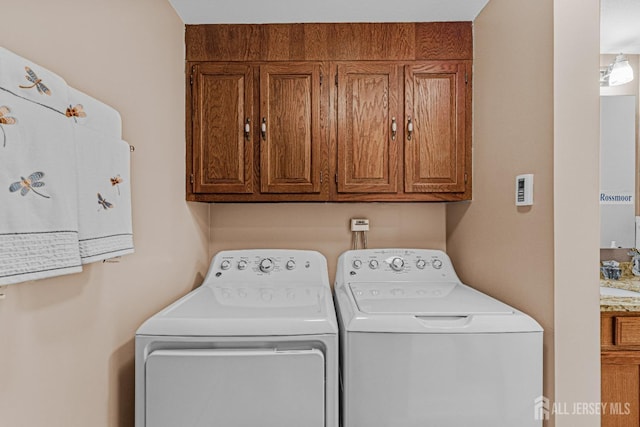 309 Sharon Way Unit A, Monroe, NJ 08831 - washroom with cabinet space and washer and clothes dryer