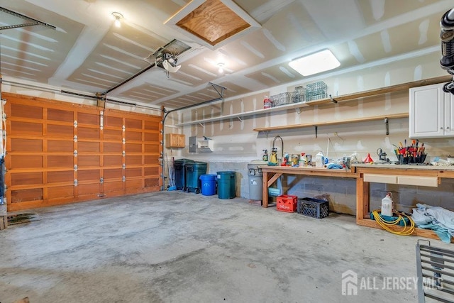 garage with a workshop area