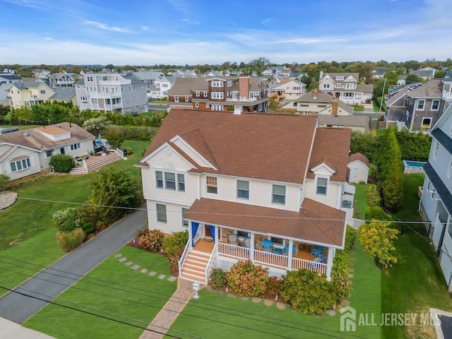drone / aerial view featuring a residential view