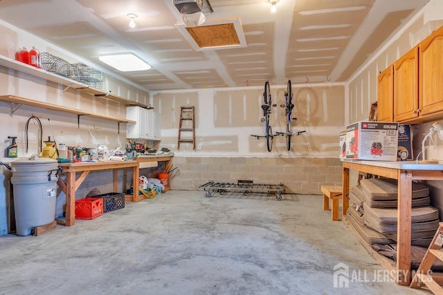 garage with a workshop area