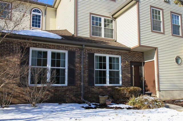 view of snow covered property