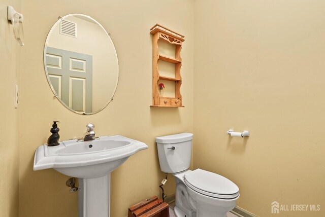 379 Sapphire Dr, Jackson, NJ 08527 - bathroom featuring toilet and baseboards