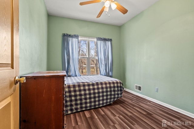 bedroom featuring ceiling fan and hardwood / wood-style floors