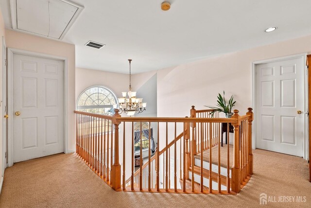 379 Sapphire Dr, Jackson, NJ 08527 - corridor with attic access, an upstairs landing, carpet, a chandelier, and recessed lighting