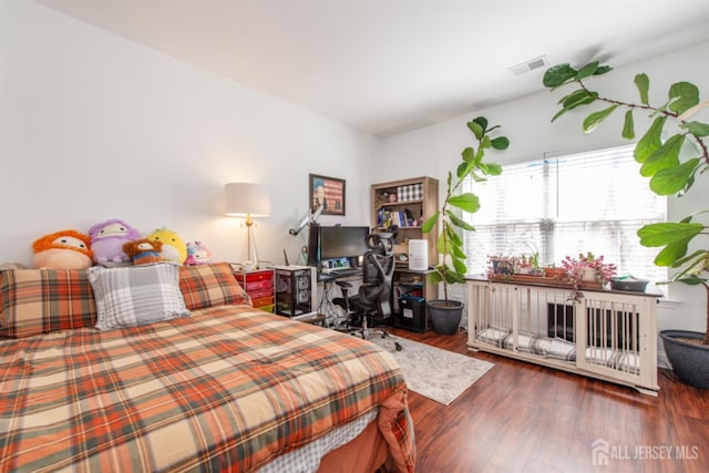 238 Lucy Ct, South Plainfield, NJ 07080 - bedroom with wood finished floors and visible vents