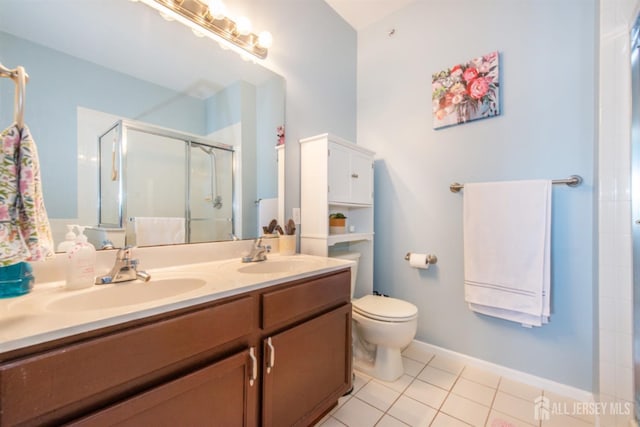 238 Lucy Ct, South Plainfield, NJ 07080 - full bath featuring a stall shower, double vanity, a sink, and tile patterned floors