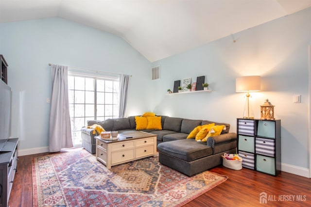 238 Lucy Ct, South Plainfield, NJ 07080 - living room featuring visible vents, baseboards, lofted ceiling, and dark wood-type flooring