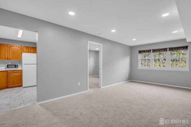 450 College Dr, Edison, NJ 08817 - empty room with recessed lighting, light marble finish floors, and light colored carpet