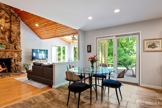 17 Theodore Dr, East Brunswick, NJ 08816 - dining space with a stone fireplace, recessed lighting, vaulted ceiling, a ceiling fan, and wood ceiling