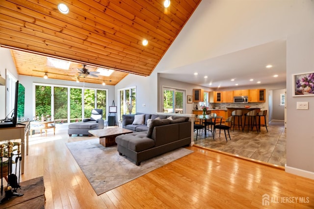17 Theodore Dr, East Brunswick, NJ 08816 - living area with light wood-type flooring, recessed lighting, high vaulted ceiling, ceiling fan, and wooden ceiling