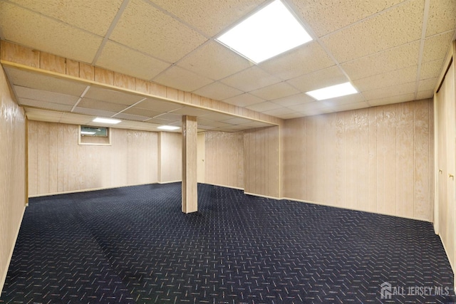 17 Theodore Dr, East Brunswick, NJ 08816 - finished below grade area featuring carpet flooring, a paneled ceiling, and wood walls