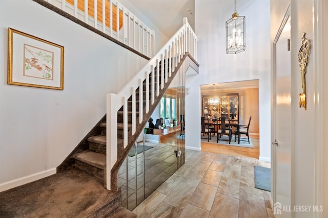 17 Theodore Dr, East Brunswick, NJ 08816 - staircase with a chandelier and a high ceiling