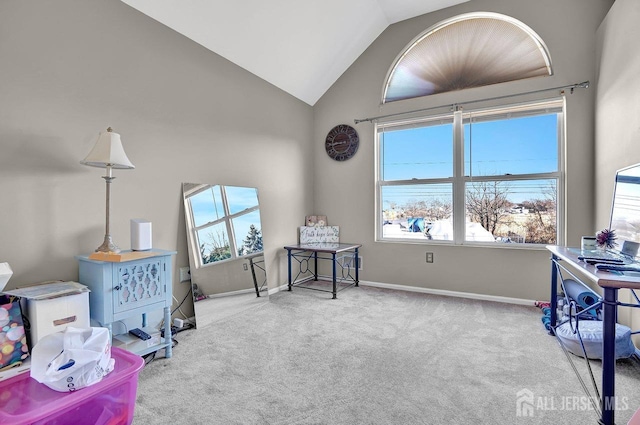 interior space featuring light colored carpet and high vaulted ceiling