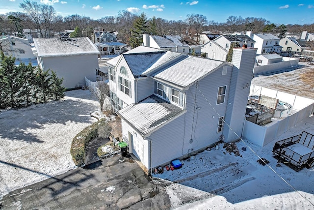 birds eye view of property with a residential view