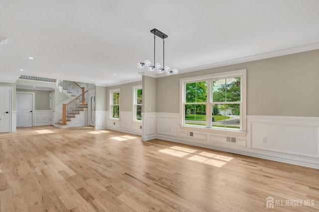 737 Wingate Dr, Bridgewater, NJ 08807 - unfurnished living room with a wainscoted wall, stairway, ornamental molding, light wood-type flooring, and recessed lighting