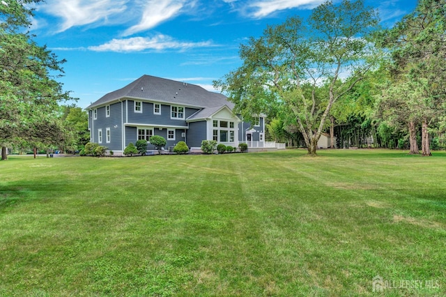737 Wingate Dr, Bridgewater, NJ 08807 - back of house featuring a lawn