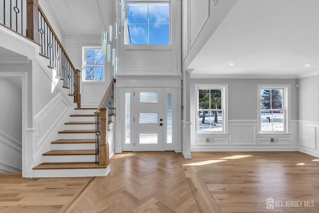 737 Wingate Dr, Bridgewater, NJ 08807 - foyer featuring a decorative wall, ornamental molding, stairs, a wainscoted wall, and recessed lighting