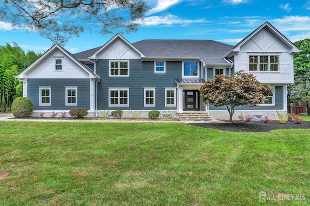 737 Wingate Dr, Bridgewater, NJ 08807 - view of front facade with a front lawn and roof with shingles