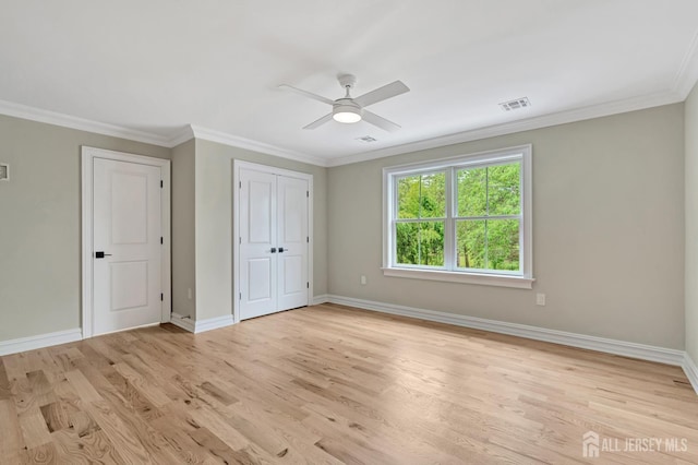 737 Wingate Dr, Bridgewater, NJ 08807 - unfurnished bedroom with light wood finished floors, crown molding, ceiling fan, and a closet