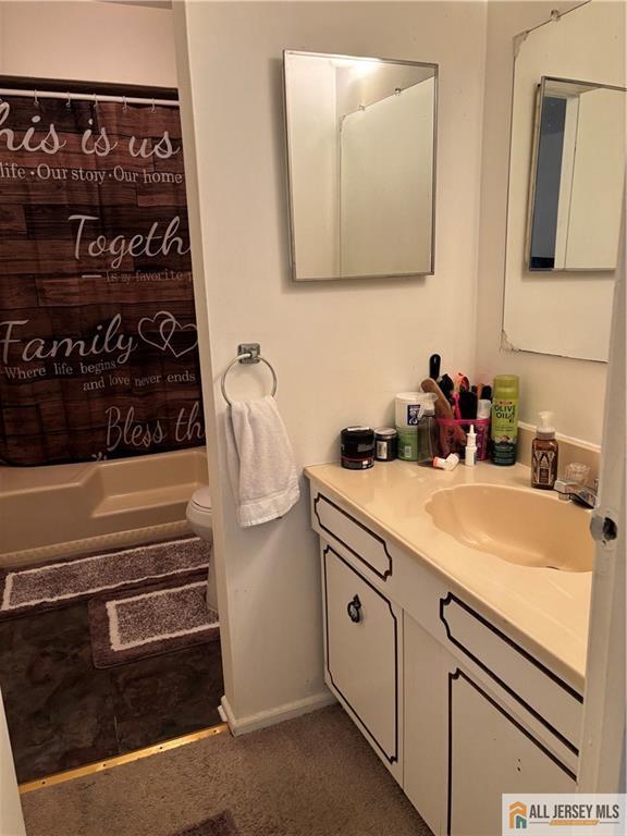 14 Camelot Pl, Washington, NJ 08080 - full bathroom featuring shower / tub combo, toilet, vanity, and baseboards