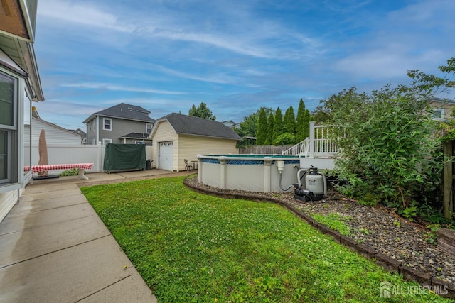 545 Myrtle Ave, Woodbridge Proper, NJ 07095 - fenced backyard with an outdoor structure and a wooden deck