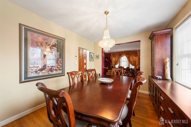 545 Myrtle Ave, Woodbridge Proper, NJ 07095 - dining room with a chandelier and wood finished floors