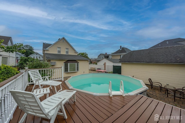 545 Myrtle Ave, Woodbridge Proper, NJ 07095 - view of swimming pool with a wooden deck and a residential view