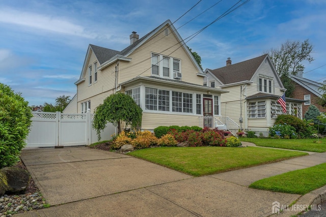 545 Myrtle Ave, Woodbridge Proper, NJ 07095 - view of front facade featuring a chimney, a gate, and concrete driveway