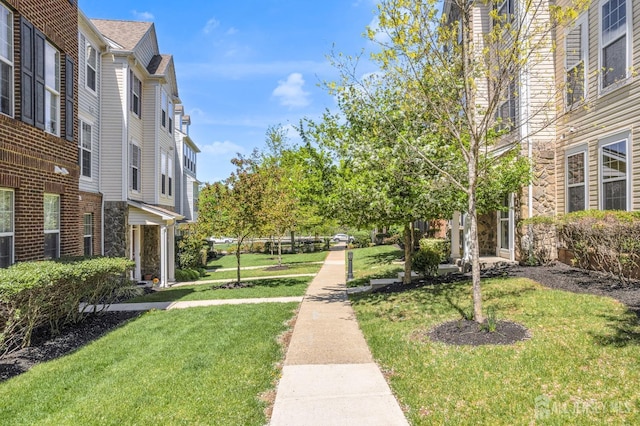 surrounding community with a lawn