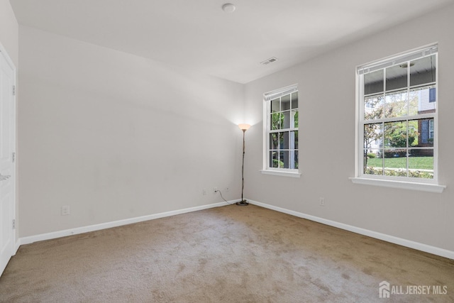 1202 Ella Ln, Highland Park, NJ 08904 - carpeted spare room with baseboards