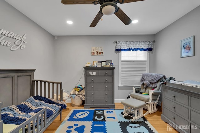 bedroom with recessed lighting, ceiling fan, and light wood-style floors