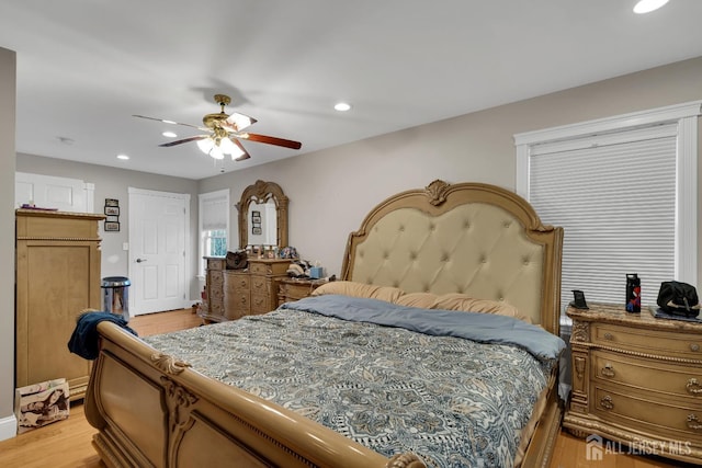 bedroom with recessed lighting, light wood-style flooring, and ceiling fan