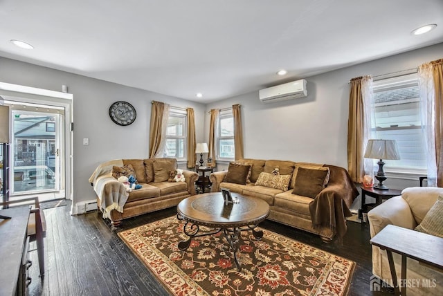 living room with a baseboard heating unit, recessed lighting, a wall unit AC, and dark wood finished floors