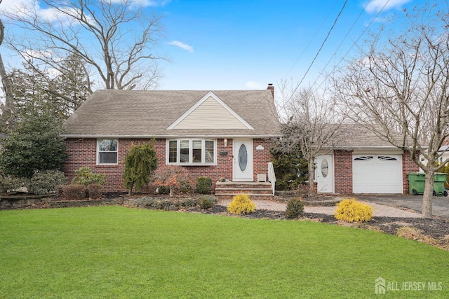 ranch-style home featuring a garage and a front lawn