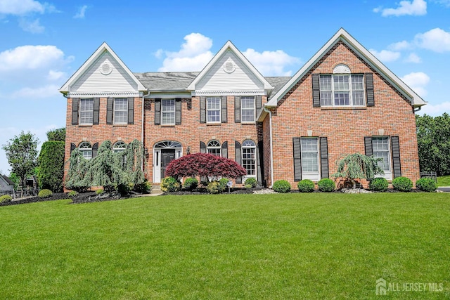 5 Bridle Ct, Monroe, NJ 08831 - colonial house featuring brick siding and a front yard
