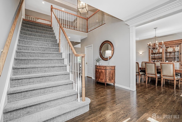 5 Bridle Ct, Monroe, NJ 08831 - stairway with a chandelier, wood finished floors, baseboards, recessed lighting, and ornamental molding