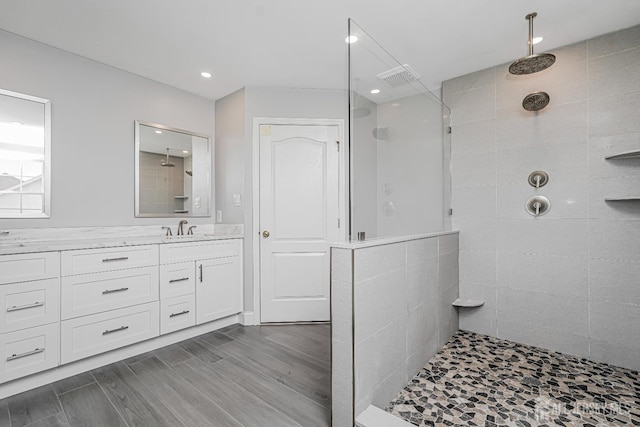 5 Bridle Ct, Monroe, NJ 08831 - full bath featuring a walk in shower, vanity, recessed lighting, and wood finished floors