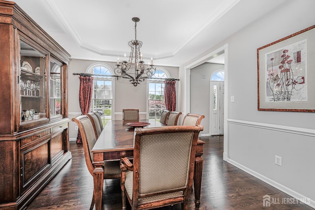 5 Bridle Ct, Monroe, NJ 08831 - dining space with a chandelier, dark wood-style floors, a tray ceiling, baseboards, and crown molding