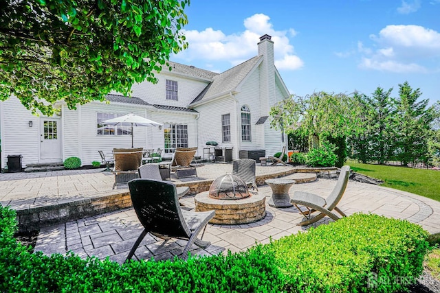 5 Bridle Ct, Monroe, NJ 08831 - view of patio / terrace featuring an outdoor fire pit