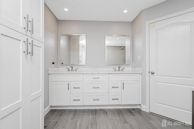 5 Bridle Ct, Monroe, NJ 08831 - full bath featuring double vanity, wood tiled floors, baseboards, a shower, and recessed lighting