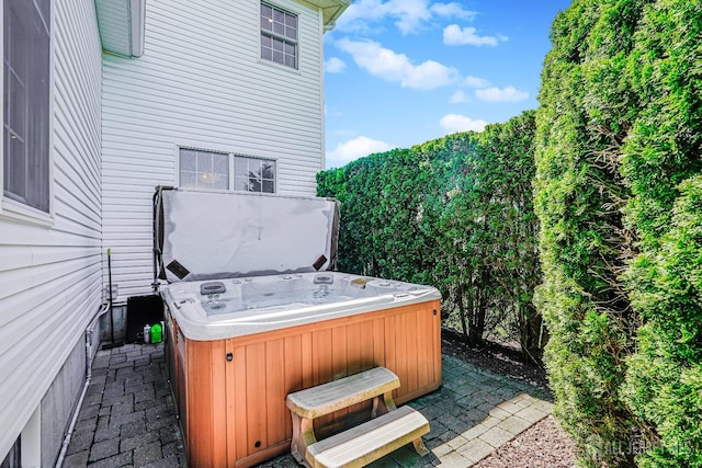 5 Bridle Ct, Monroe, NJ 08831 - view of patio / terrace with a hot tub