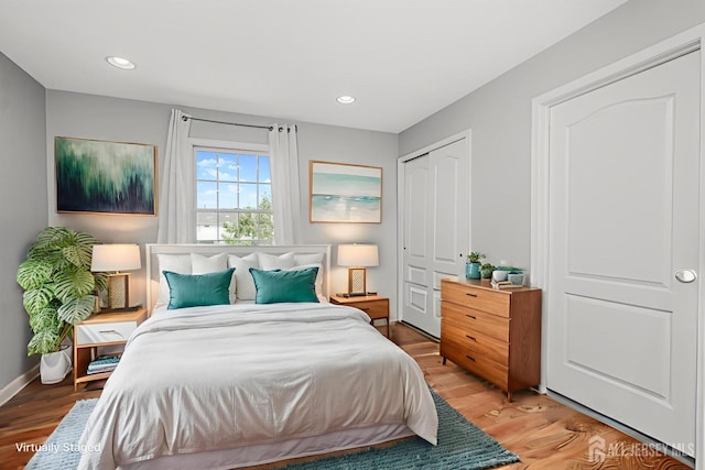 5 Bridle Ct, Monroe, NJ 08831 - bedroom with light wood-style flooring, a closet, baseboards, and recessed lighting