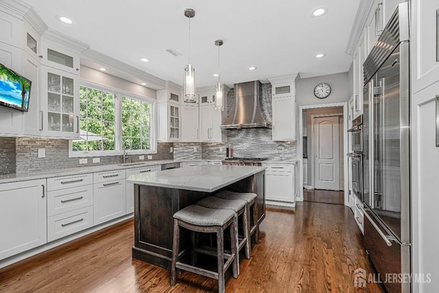 5 Bridle Ct, Monroe, NJ 08831 - kitchen featuring wall chimney exhaust hood, white cabinets, stainless steel appliances, and recessed lighting