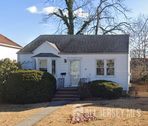 28 Madison Ave, Avenel, NJ 07001 - view of front of property featuring a shingled roof